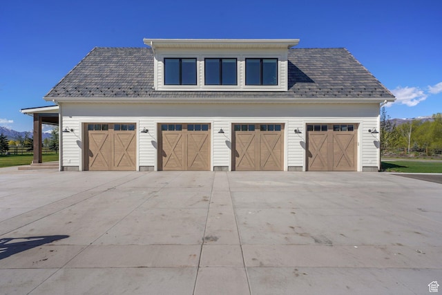 1685 W Midway Ln, Heber City, UT 84032 - garage with concrete driveway and a mountain view