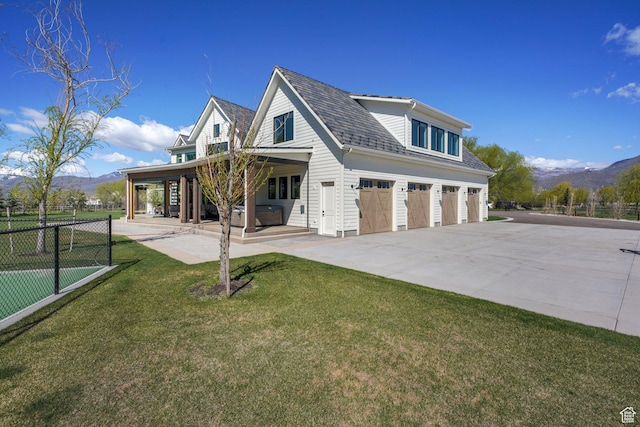 1685 W Midway Ln, Heber City, UT 84032 - view of front of house featuring fence, a garage, a mountain view, and concrete driveway