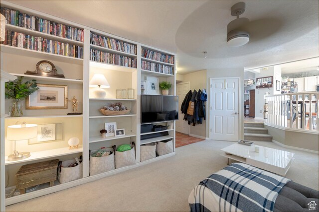 1446 E Murdock Dr S, Pleasant Grove, UT 84062 - living area with carpet flooring, stairway, and baseboards