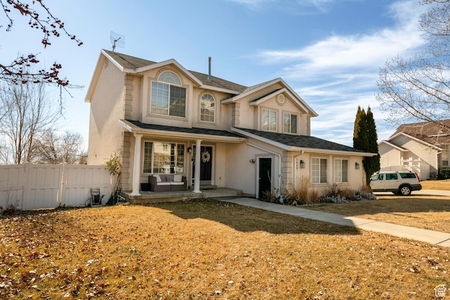 1446 E Murdock Dr S, Pleasant Grove, UT 84062 - traditional-style house featuring covered porch, a front lawn, fence, and stucco siding