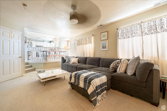 1446 E Murdock Dr S, Pleasant Grove, UT 84062 - living area with carpet floors, ceiling fan, visible vents, and a textured ceiling