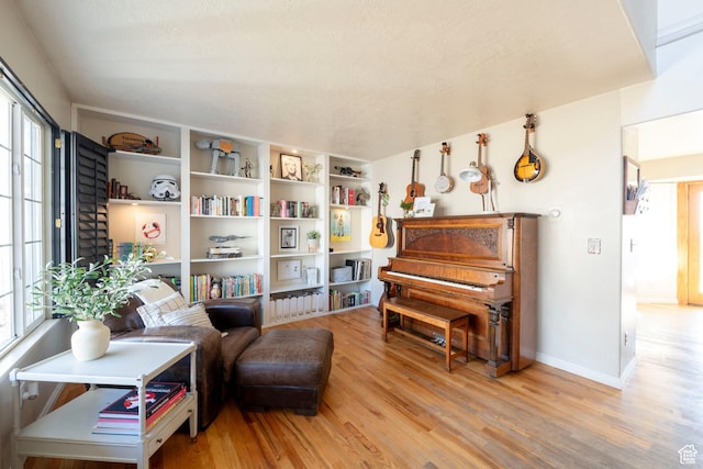 1446 E Murdock Dr S, Pleasant Grove, UT 84062 - sitting room with light wood-type flooring and baseboards