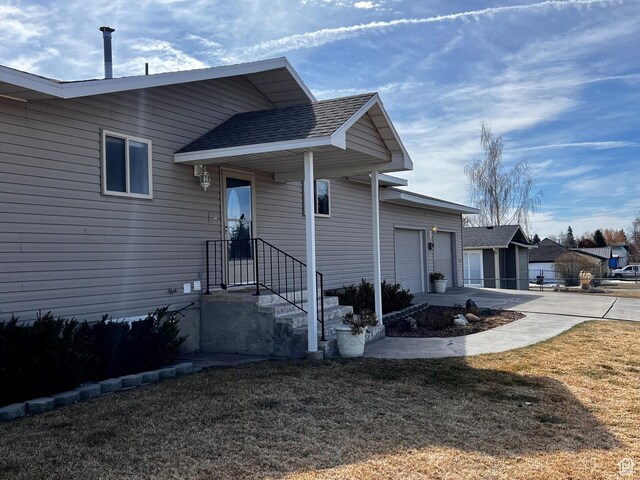 404 N 1st E, Grace, ID 83241 - view of property exterior featuring driveway and an attached garage