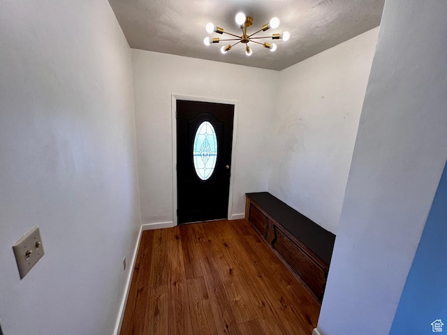 404 N 1st E, Grace, ID 83241 - entryway with baseboards, wood finished floors, and an inviting chandelier