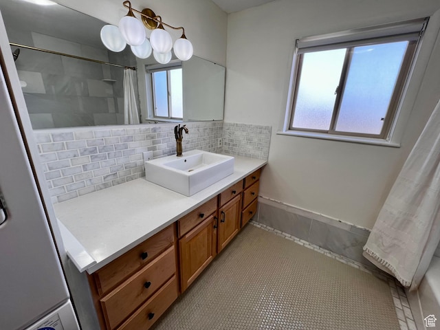 404 N 1st E, Grace, ID 83241 - bathroom with vanity and tasteful backsplash