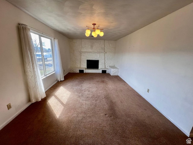 404 N 1st E, Grace, ID 83241 - unfurnished living room with baseboards, a fireplace, and carpet