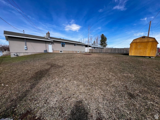 404 N 1st E, Grace, ID 83241 - view of yard featuring an outbuilding, a shed, and fence