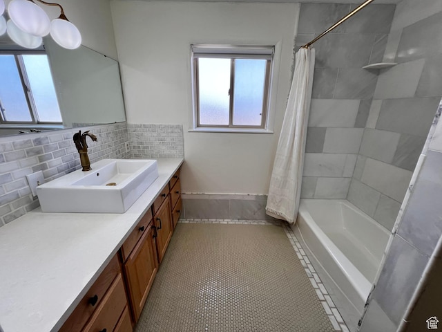 404 N 1st E, Grace, ID 83241 - bathroom with vanity, baseboards, backsplash, tile patterned floors, and shower / bath combo with shower curtain