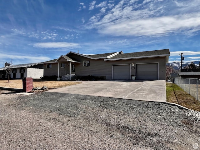 404 N 1st E, Grace, ID 83241 - ranch-style house with concrete driveway, a garage, and fence