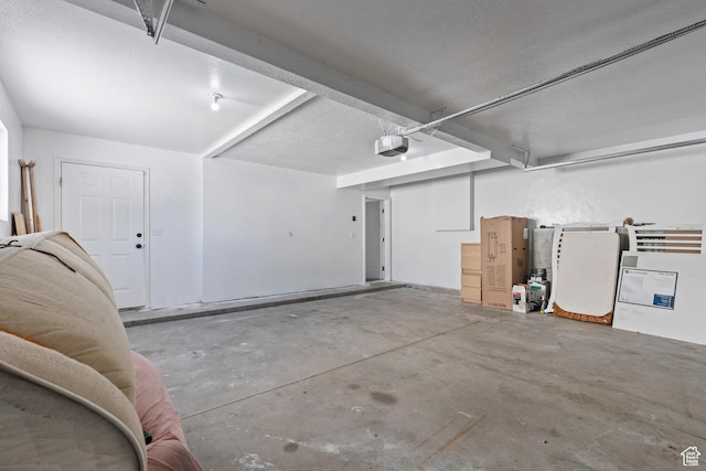 257 Rosewood Cir, Logan, UT 84321 - garage featuring a garage door opener