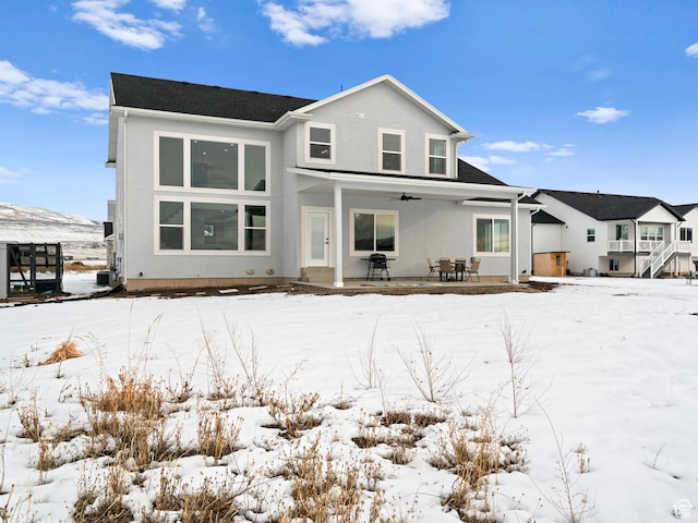 8345 W 11050 N, Tremonton, UT 84337 - snow covered property featuring stucco siding