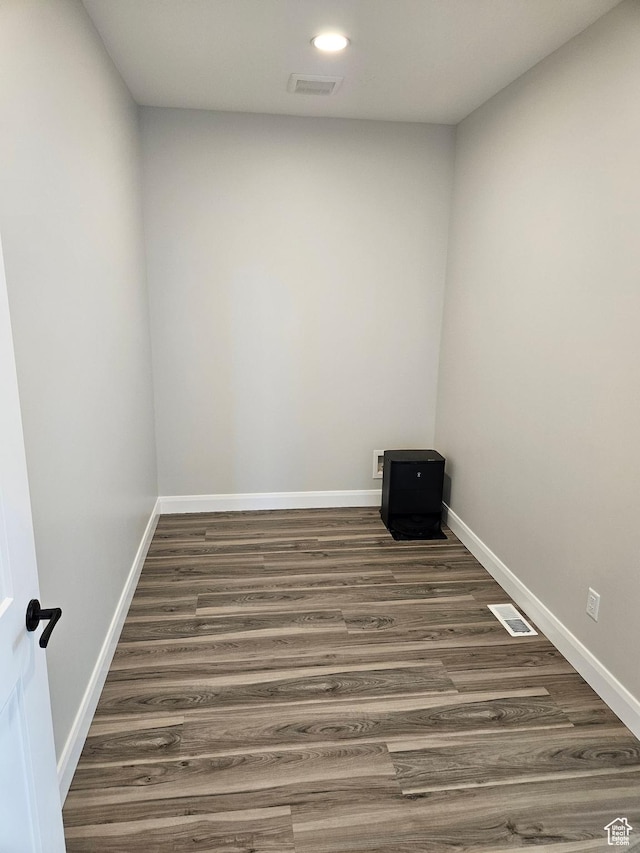 8345 W 11050 N, Tremonton, UT 84337 - spare room with baseboards, visible vents, and wood finished floors