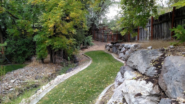 view of yard with fence