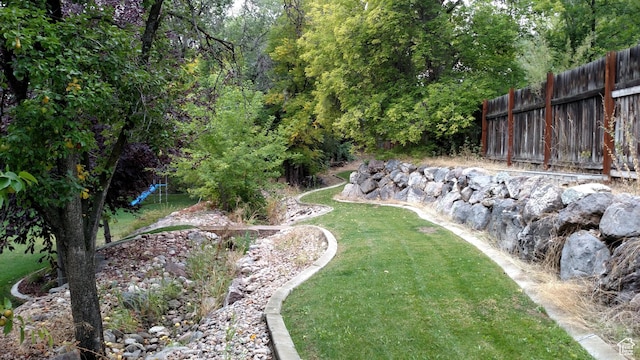 view of yard featuring fence
