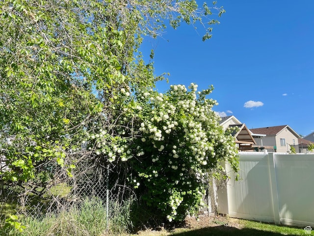 view of property exterior with fence