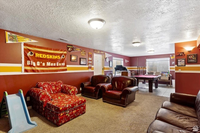 rec room featuring pool table, a textured ceiling, and carpet floors