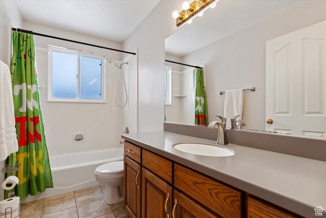 bathroom featuring shower / tub combo with curtain, toilet, vanity, and tile patterned floors