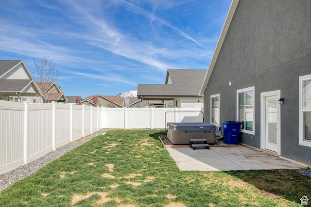 4386 W 3800 S, West Haven, UT 84401 - view of yard featuring a hot tub, a patio area, and a fenced backyard