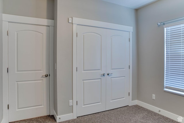 4386 W 3800 S, West Haven, UT 84401 - unfurnished bedroom featuring baseboards, a closet, and carpet flooring
