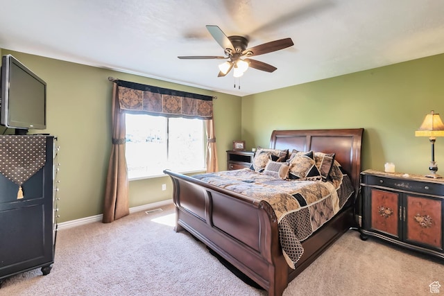 8783 N Franklin Dr, Eagle Mountain, UT 84005 - bedroom with light carpet, visible vents, baseboards, and a ceiling fan
