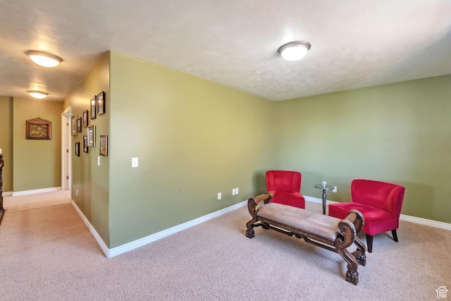 8783 N Franklin Dr, Eagle Mountain, UT 84005 - living area featuring a textured ceiling, carpet floors, and baseboards