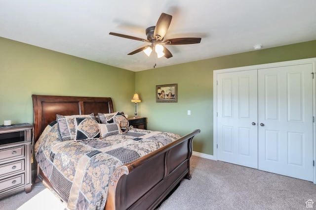8783 N Franklin Dr, Eagle Mountain, UT 84005 - bedroom with a closet, light carpet, ceiling fan, and baseboards