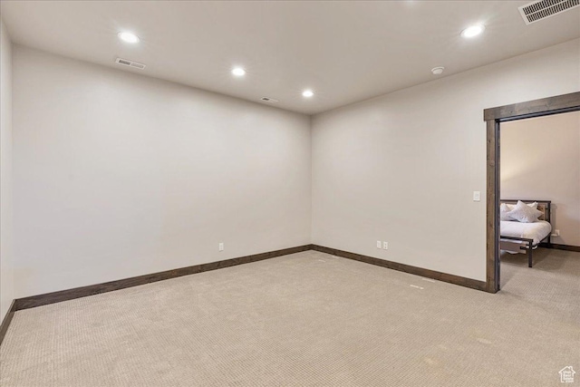 14408 N Buck Horn Trl N Unit 52C, Kamas, UT 84036 - spare room with recessed lighting, visible vents, baseboards, and light colored carpet
