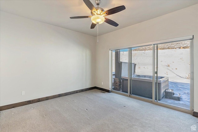 14408 N Buck Horn Trl N Unit 52C, Kamas, UT 84036 - spare room with carpet, a ceiling fan, and baseboards