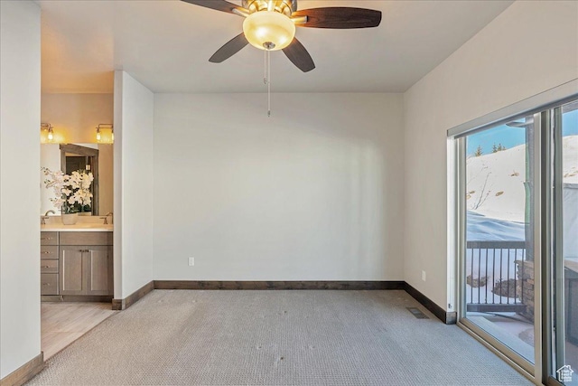 14408 N Buck Horn Trl N Unit 52C, Kamas, UT 84036 - spare room with baseboards, visible vents, ceiling fan, and light colored carpet