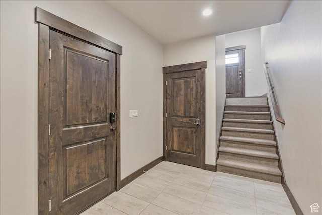 14408 N Buck Horn Trl N Unit 52C, Kamas, UT 84036 - entrance foyer with light tile patterned floors, baseboards, and stairs