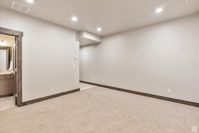 14408 N Buck Horn Trl N Unit 52C, Kamas, UT 84036 - below grade area featuring light carpet, baseboards, visible vents, and recessed lighting