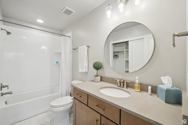 6698 Purple Poppy Ln Unit 11, Park City, UT 84098 - full bathroom featuring shower / bath combo, visible vents, toilet, tile patterned flooring, and vanity