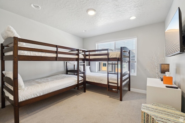 6698 Purple Poppy Ln Unit 11, Park City, UT 84098 - bedroom featuring light carpet, a textured ceiling, recessed lighting, and baseboards