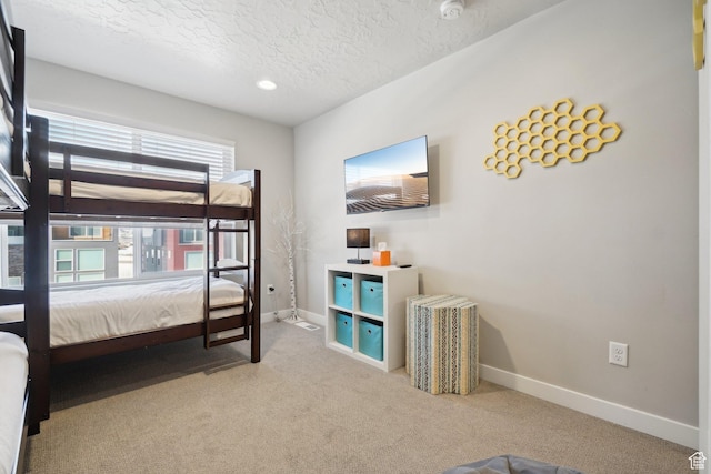6698 Purple Poppy Ln Unit 11, Park City, UT 84098 - bedroom with a textured ceiling, carpet floors, and baseboards