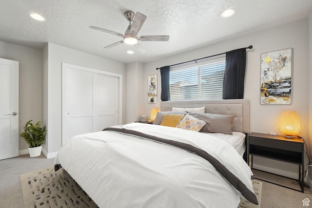 6698 Purple Poppy Ln Unit 11, Park City, UT 84098 - bedroom with a textured ceiling, baseboards, a closet, and carpet flooring