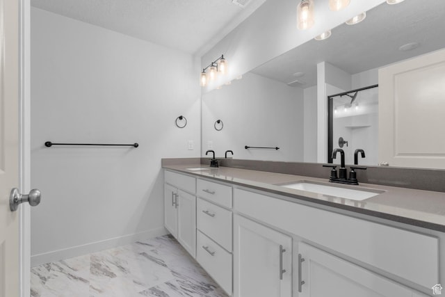 1786 N 180 E, Heber City, UT 84032 - bathroom featuring marble finish floor, double vanity, a sink, and baseboards