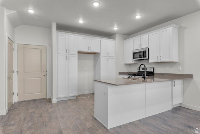 1786 N 180 E, Heber City, UT 84032 - kitchen with a peninsula, appliances with stainless steel finishes, and white cabinets