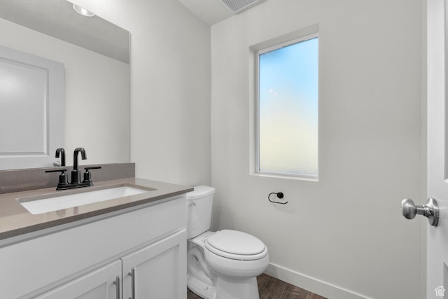 1786 N 180 E, Heber City, UT 84032 - half bath with visible vents, baseboards, toilet, wood finished floors, and vanity