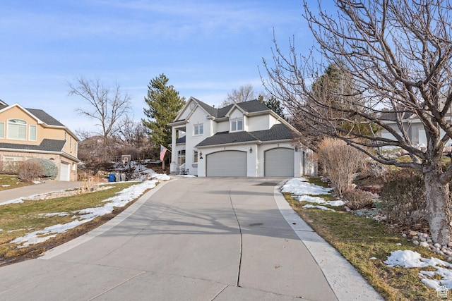 34 N Scenic Hills Cir E, North Salt Lake, UT 84054 - view of front of property with asphalt driveway, stucco siding, a garage, and a shingled roof