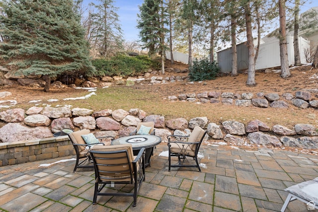 34 N Scenic Hills Cir E, North Salt Lake, UT 84054 - view of patio / terrace with a fire pit
