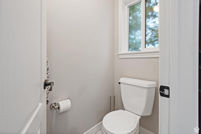 34 N Scenic Hills Cir E, North Salt Lake, UT 84054 - bathroom with healthy amount of natural light, baseboards, and toilet