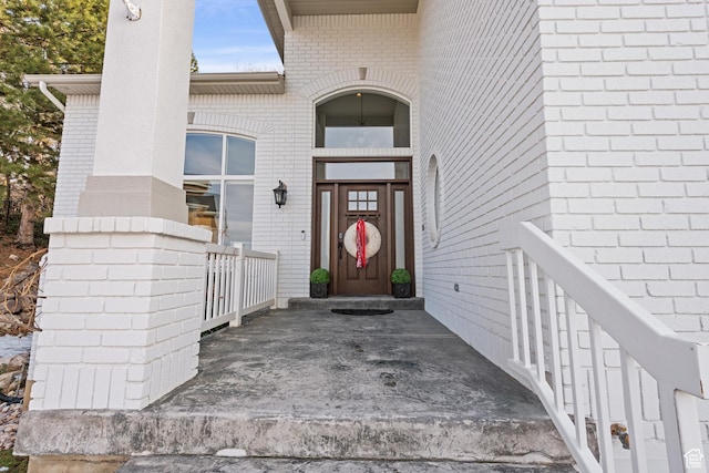 34 N Scenic Hills Cir E, North Salt Lake, UT 84054 - doorway to property featuring brick siding