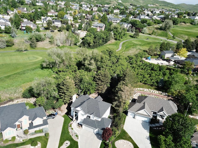 34 N Scenic Hills Cir E, North Salt Lake, UT 84054 - aerial overview of property's location with nearby suburban area, a golf course, and a mountainous background