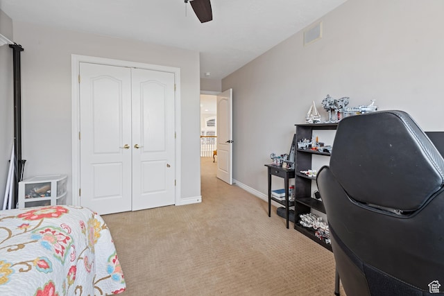 34 N Scenic Hills Cir E, North Salt Lake, UT 84054 - bedroom featuring an office area, a closet, light colored carpet, ceiling fan, and baseboards