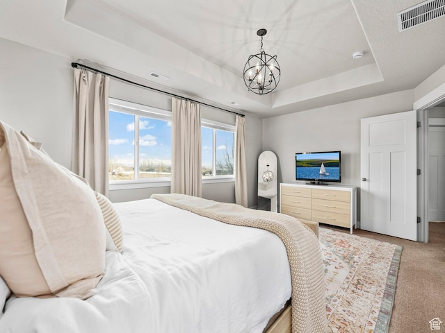 1463 S Lake View Terrace Rd, Saratoga Springs, UT 84045 - bedroom featuring visible vents, a tray ceiling, a chandelier, and light colored carpet