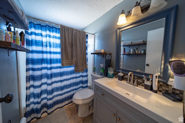 full bathroom with a shower with curtain, toilet, a textured ceiling, vanity, and tile patterned flooring