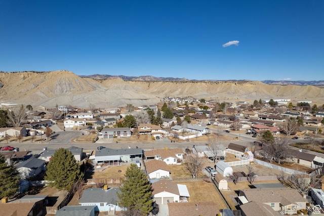 bird's eye view with a residential view and a mountain view