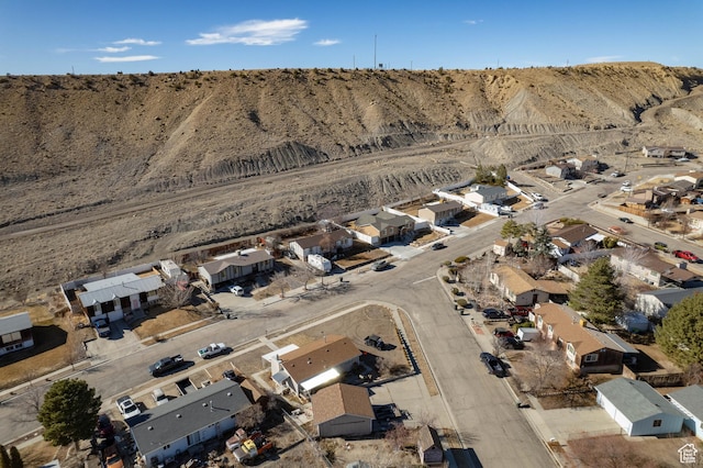 birds eye view of property with a residential view