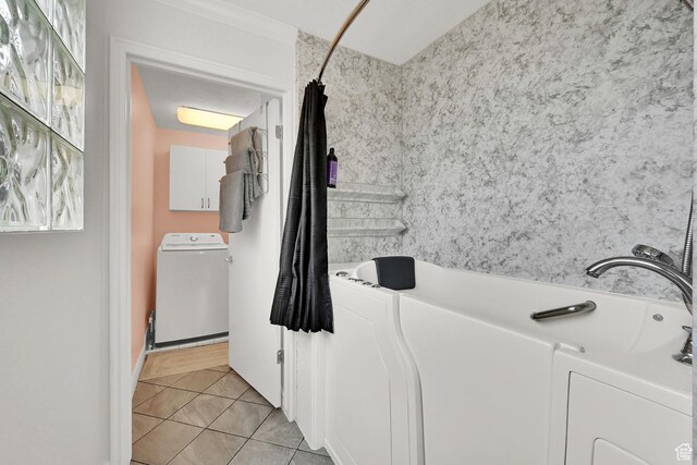 59 Belmore Dr, Kaysville, UT 84037 - full bath with shower / tub combo with curtain, washer and dryer, and tile patterned floors