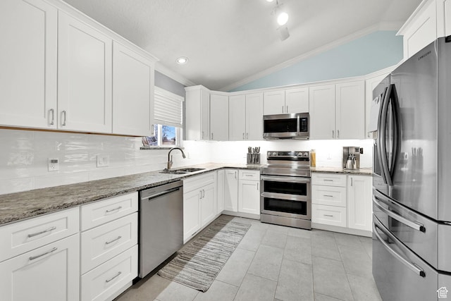 59 Belmore Dr, Kaysville, UT 84037 - kitchen featuring white cabinets, dark stone countertops, stainless steel appliances, and a sink